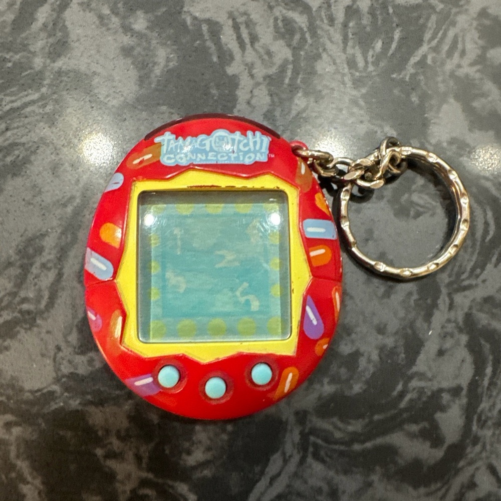 2004 Tamagotchi Connection V2 Red Jellybean Candy Version - Working